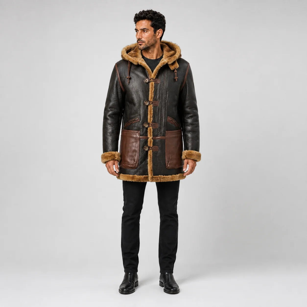 Front view of men’s brown B7 leather flying parka with shearling hood, toggle-style fastening and contrast waist pockets