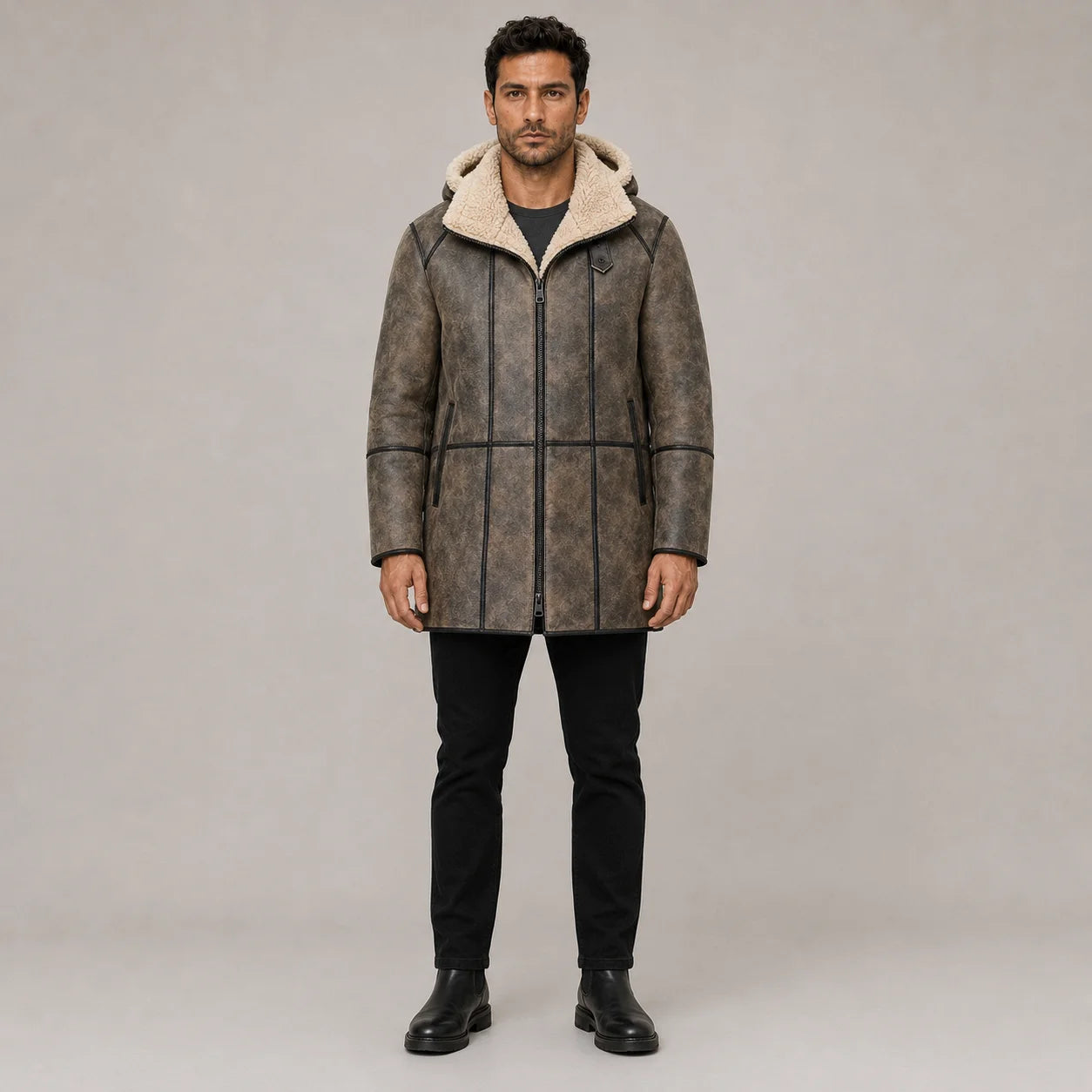Front studio view of distressed brown B7 hooded aviator coat with cream shearling collar, dark piping and zip pockets