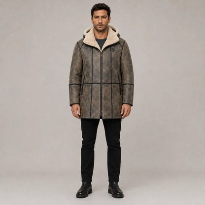Front studio view of distressed brown B7 hooded aviator coat with cream shearling collar, dark piping and zip pockets