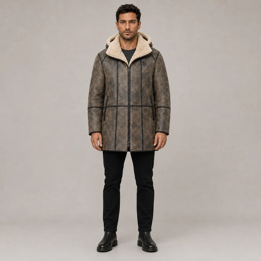 Front studio view of distressed brown B7 hooded aviator coat with cream shearling collar, dark piping and zip pockets