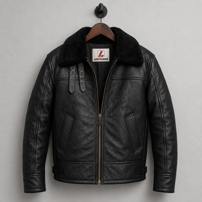Hanging front view of black aviator bomber jacket with centre gold-tone zip, angled pockets and Leathvora neck label