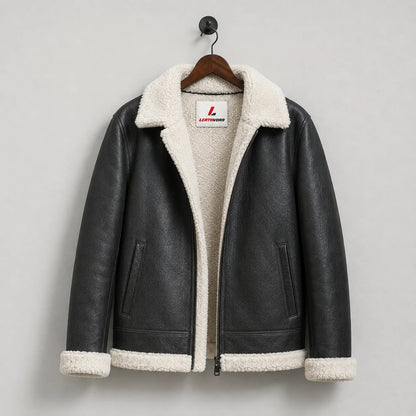 Hanging front view of black aviator jacket with contrasting white lining, angled pockets and Leathvora neck label