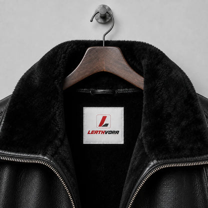 Close-up of black fleece-style collar and interior with stitched Leathvora branding and visible front zipper edges