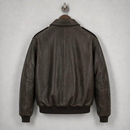 Close-up of brown leather flight jacket collar with beige map-print lining and Leathvora branding
