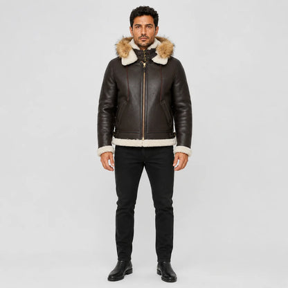Front model view of brown B3 hooded bomber jacket with cream shearling trim, double buckle collar and zip front.