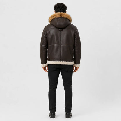 Rear full-length view of men’s brown hooded B3 jacket showing panelled leather back, fur-trim hood and shearling hem.