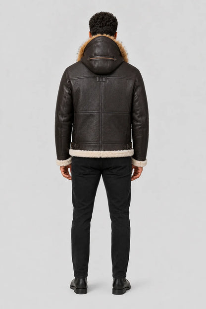 Closer rear view highlighting the structured hood, brown leather back panels, side waist buckles and cream trim.