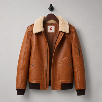 Hanging front view of camel brown sheepskin bomber showing cream collar, smooth lining, pockets and front closure