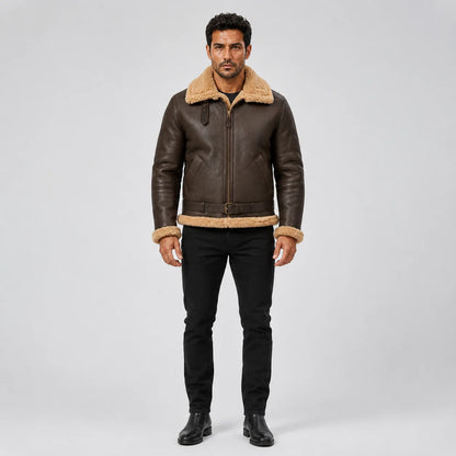 Straight front model view of men’s brown RAF B3 sheepskin bomber with tan collar, cuffs, hem, pockets and waist belt.