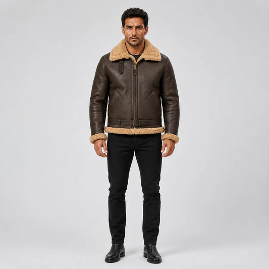 Straight front model view of men’s brown RAF B3 sheepskin bomber with tan collar, cuffs, hem, pockets and waist belt.