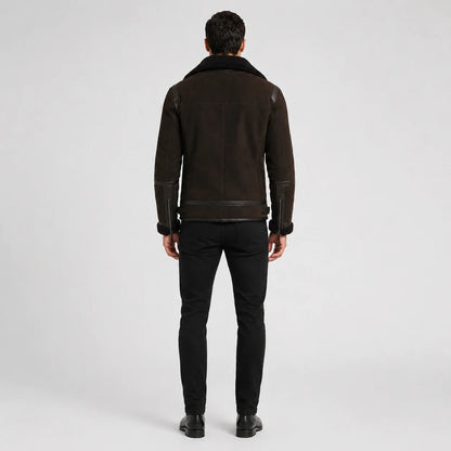 Rear studio view of brown aviator jacket showing clean back yoke, centre seam, waist tabs and cuff zippers