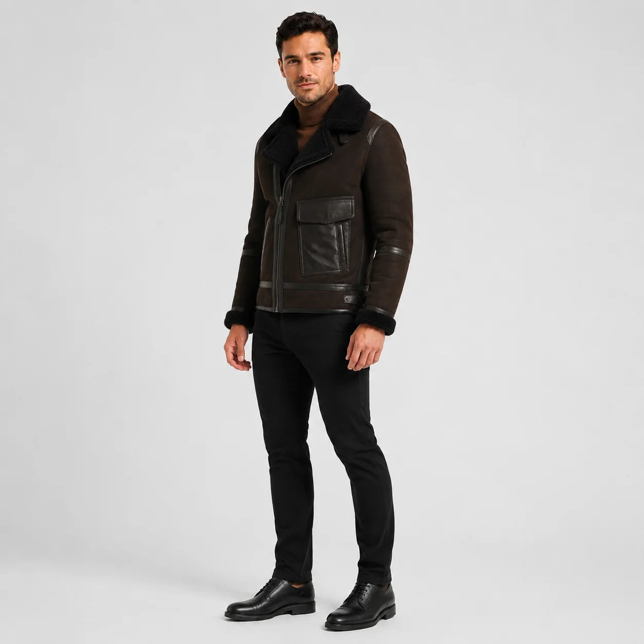 Three-quarter view of dark brown asymmetric aviator jacket showing flap utility pocket and contrast trim