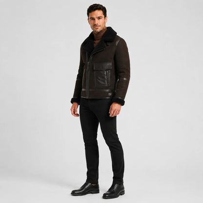 Three-quarter view of dark brown asymmetric aviator jacket showing flap utility pocket and contrast trim