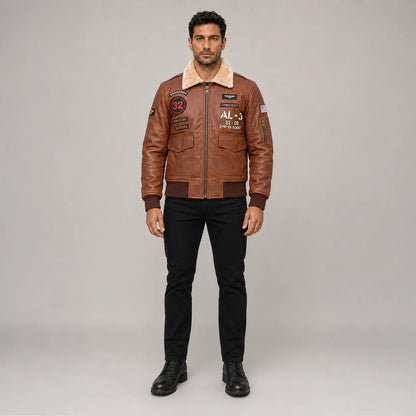 Front studio view of men’s brown aviator bomber jacket with cream collar, aviation patches, cargo pockets and ribbed hem