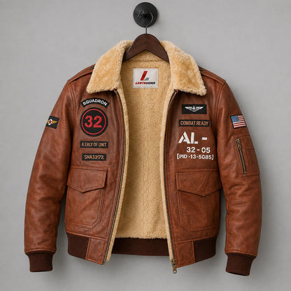 Hanging front view of brown aviator jacket showing cream interior, military-style patches and large flap pockets