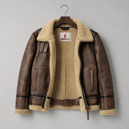 Hanging open front view of brown B3 jacket with cream fleece interior, collar straps, front pockets and leather waist belt