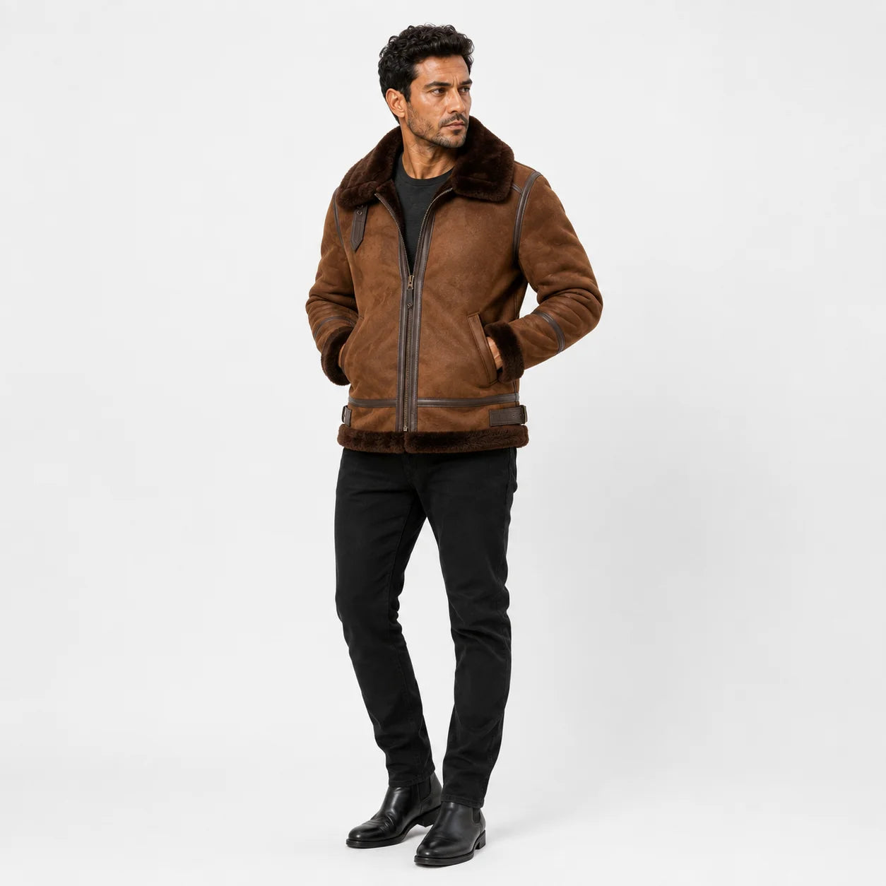 Three-quarter model view wearing brown suede aviator jacket with dark shearling collar, zip front and side pockets