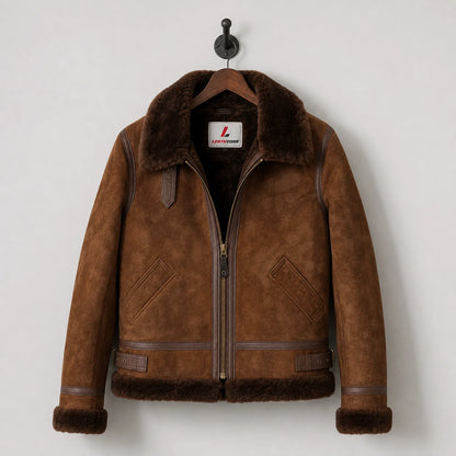Front hanging view of men’s brown suede B3 jacket with chocolate shearling lining, side pockets and waist tabs