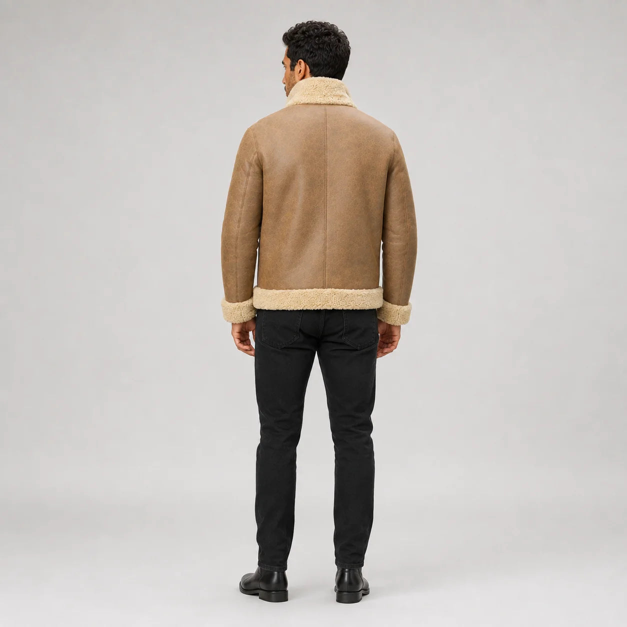Back studio view of men’s camel brown B3 sheepskin jacket with cream collar, cuffs, hem trim and clean centre seam