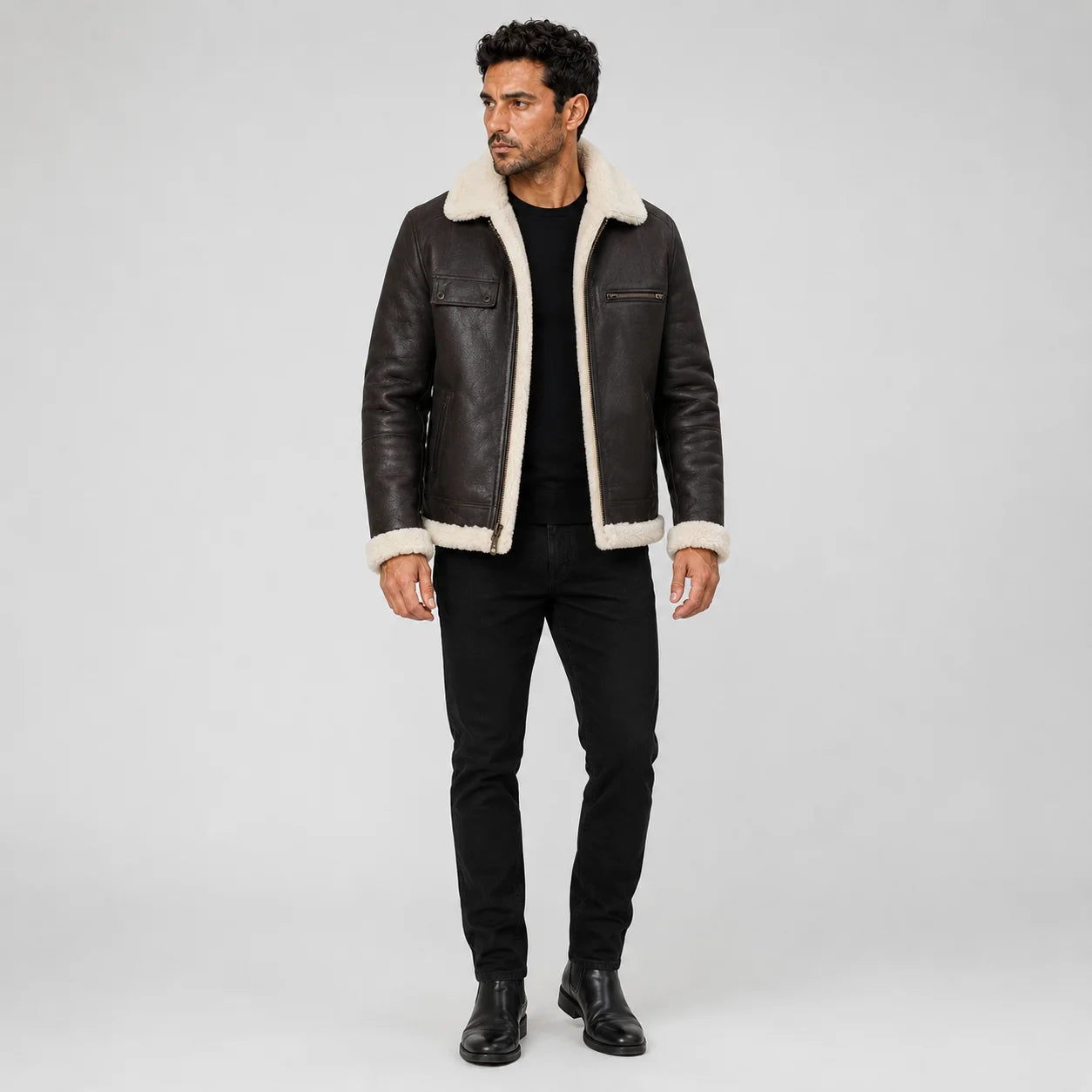 Full front model view wearing dark brown B3 leather bomber jacket with cream shearling collar, cuffs and hem.