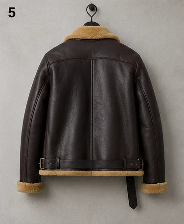 Hanging rear view of brown sheepskin flight jacket with centre seam, shoulder yoke, tan hem and waist belt