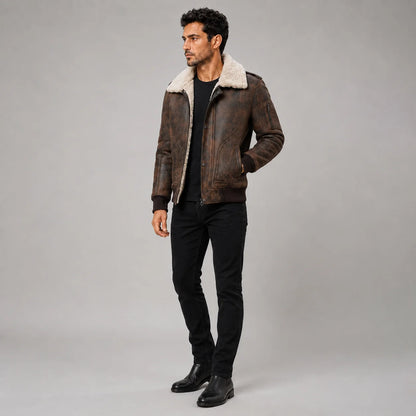 Three-quarter studio view of brown RAF shearling jacket showing front pockets, sleeve zip pocket and distressed finish