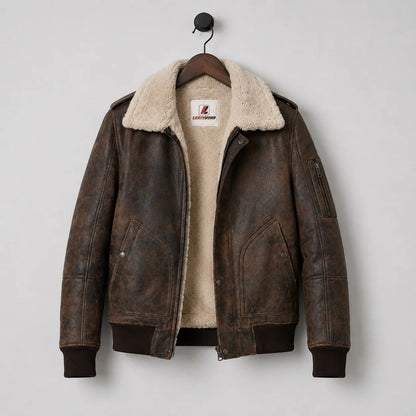 Hanging front view of distressed brown sheepskin aviator jacket with cream interior, pockets and Leathvora label