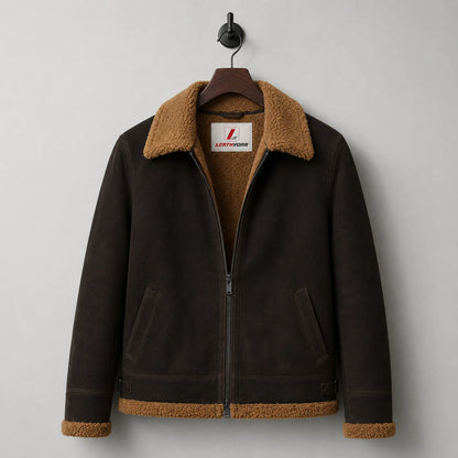Hanging front view of brown aviator jacket showing tan plush lining, collar, zip closure and two welt-style pockets