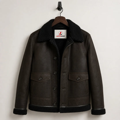 Hanging front view of dark green aviator jacket with black plush lining, flap pockets and Leathvora neck label
