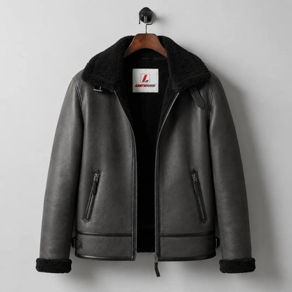 Hanging front view of charcoal aviator jacket with black plush lining, collar buckle and two zipped hand pockets