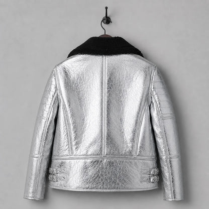 Rear hanging view of shiny silver shearling leather jacket showing centre seam, shaped panels and side buckle straps