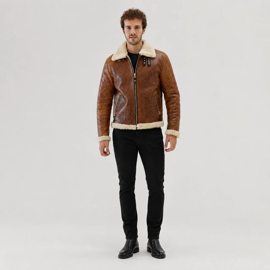 Front studio view of men’s tan aviator jacket with cream plush collar, centre zip and two angled zipped pockets
