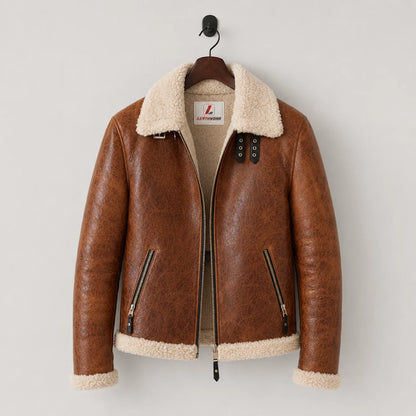 Hanging front view of tan aviator jacket with cream plush lining, angled zip pockets and collar strap details