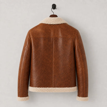 Hanging rear view of tan flight jacket showing textured finish, cream collar and hem with central back seam