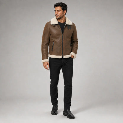 Three-quarter studio view of brown pilot jacket with cream collar, centre zipper and vertical zip hand pockets