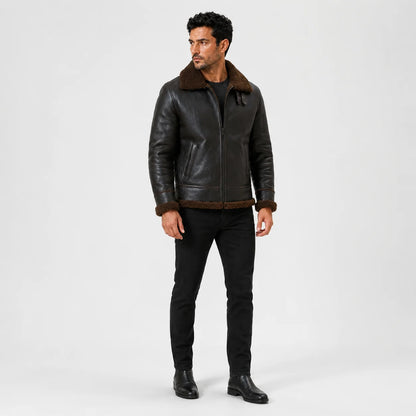 Three-quarter model view highlighting tobacco brown textured outer, plush collar, front zip and vertical hand pockets