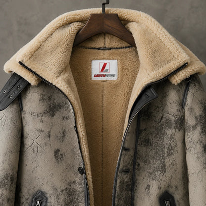 Close-up of cream double shearling collar, distressed grey sheepskin panels, dark trim and Leathvora inner neck label