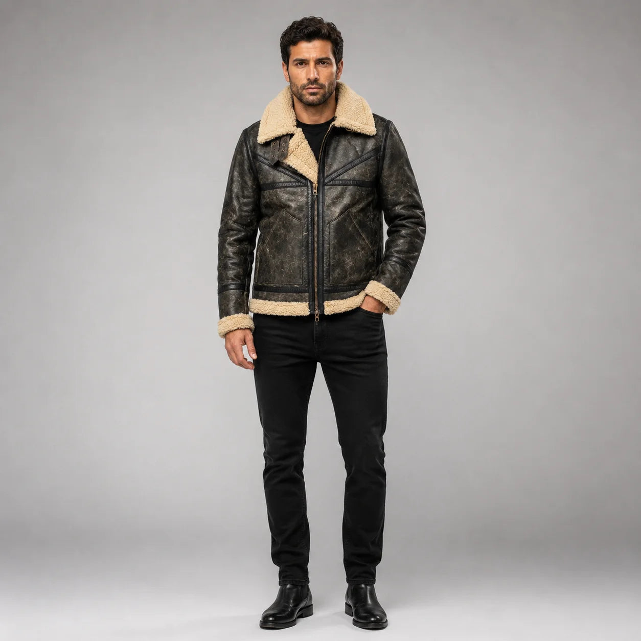 Front studio view of men’s distressed dark sheepskin Sherpa jacket with cream collar, zip front and panelled pockets