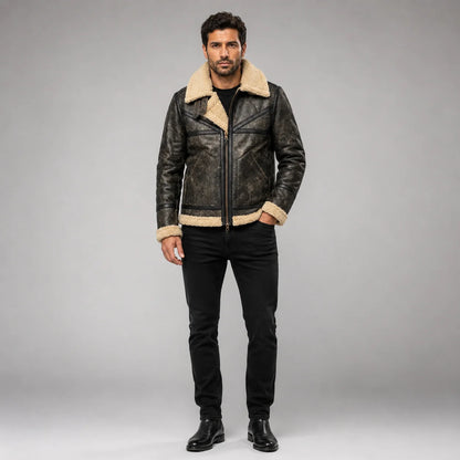 Front studio view of men’s distressed dark sheepskin Sherpa jacket with cream collar, zip front and panelled pockets
